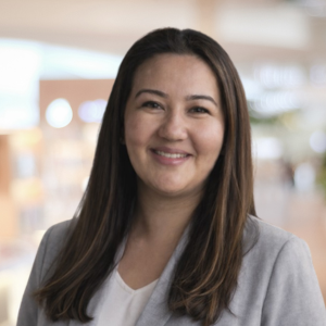 a professional headshot of Munis Owenby